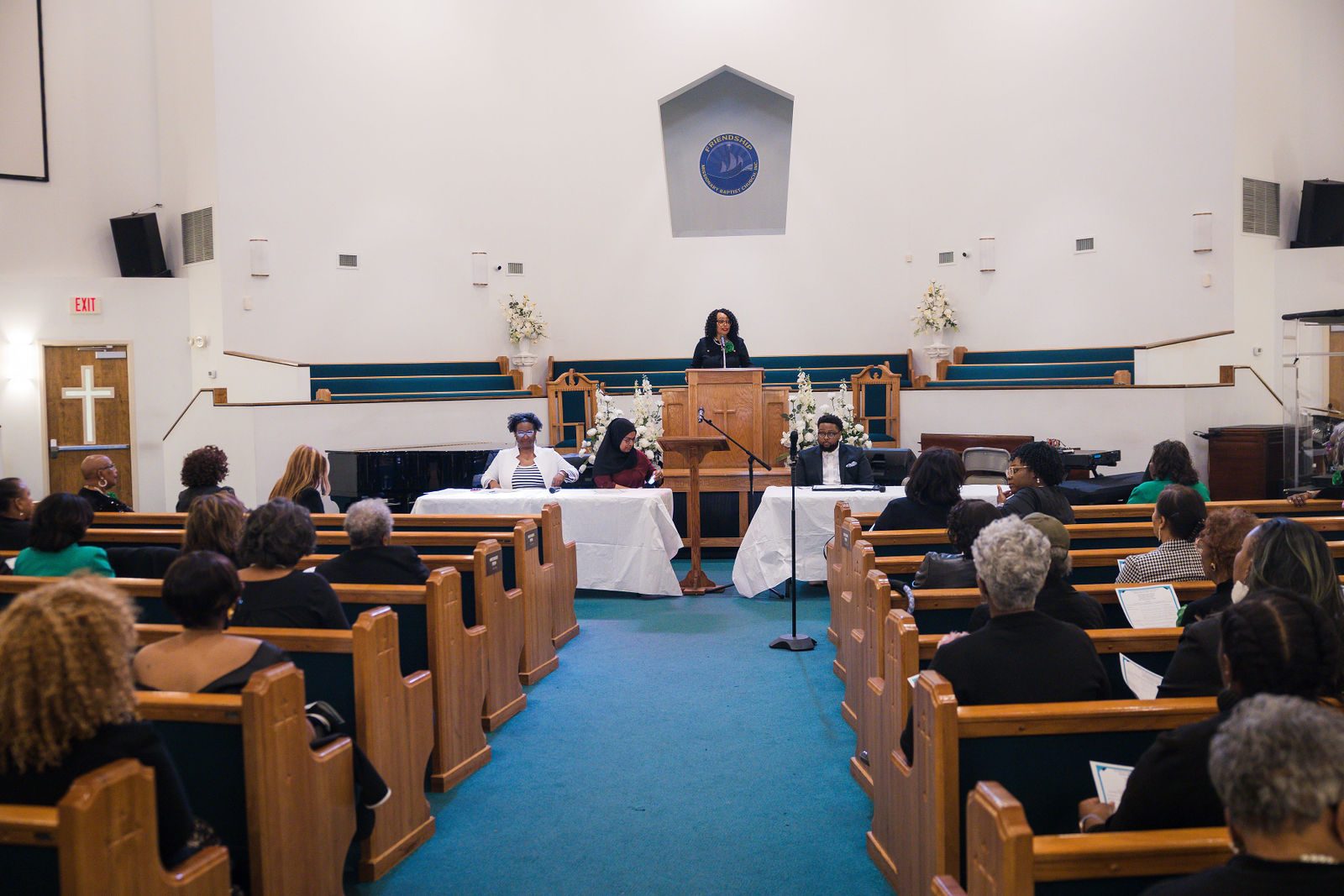 Wide view of Friendship Missionary Baptist Church sanctuary during a service