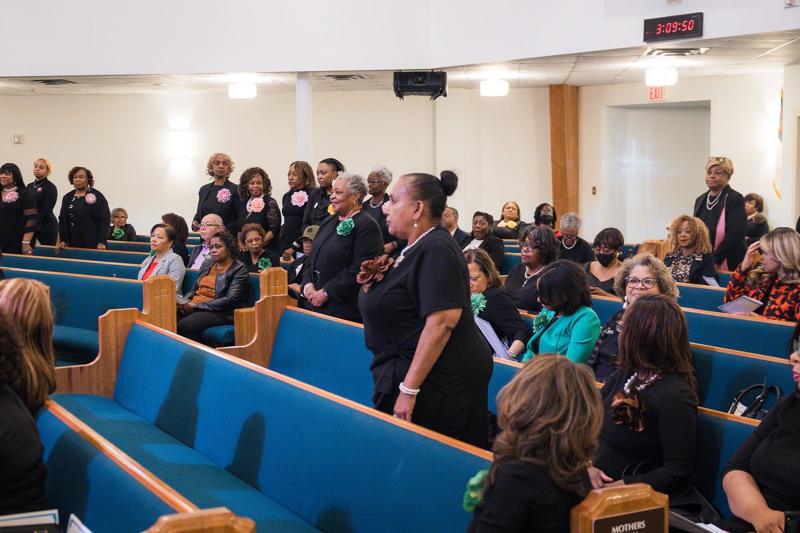 Women of the church applauding