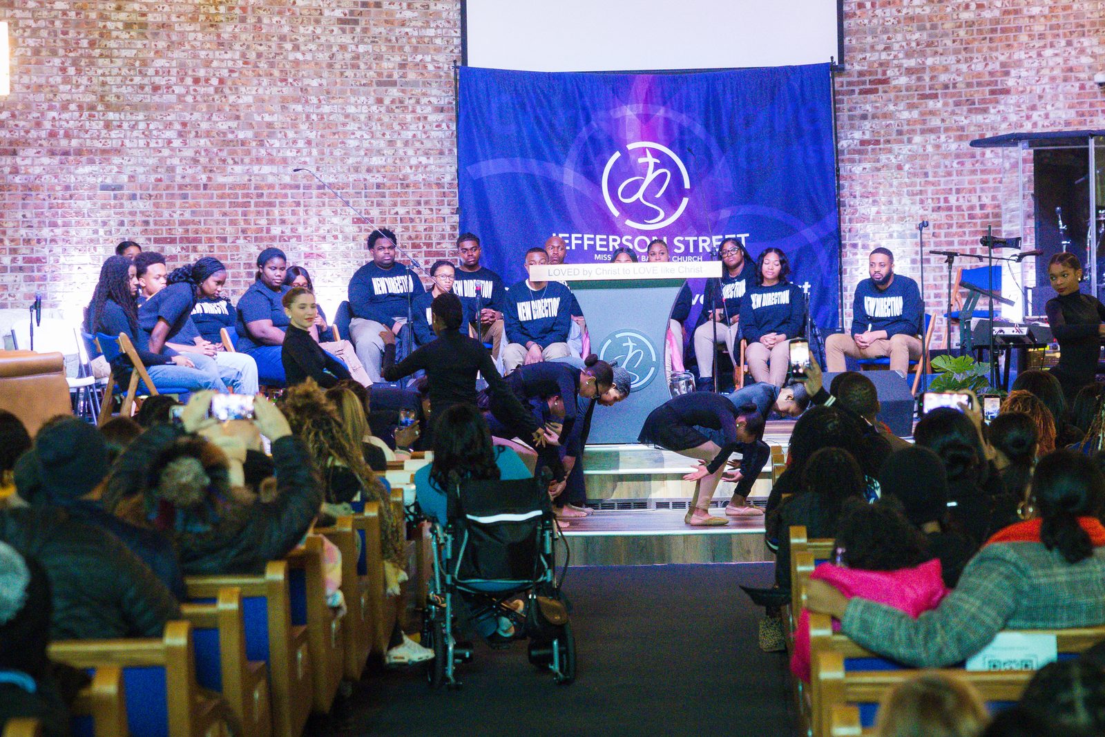 Youth filling the pews for an MLK Day service