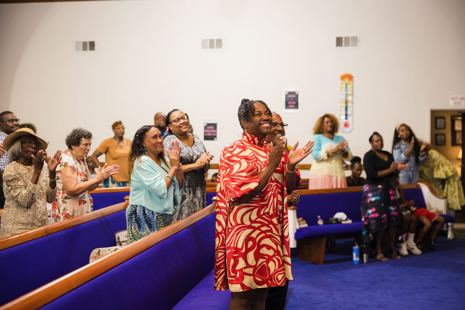 Church members dancing in the aisle