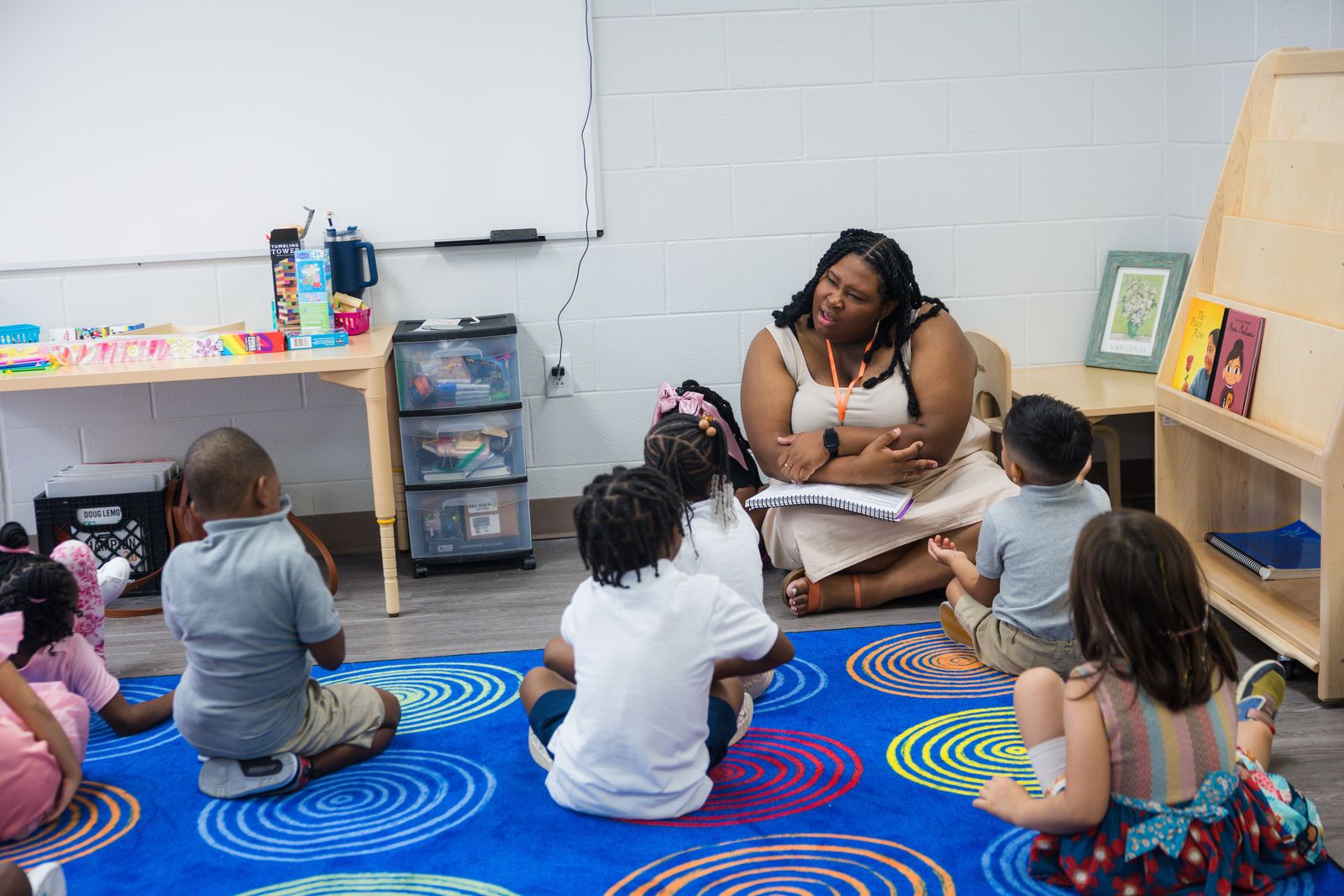 Teacher reading with students on the first day