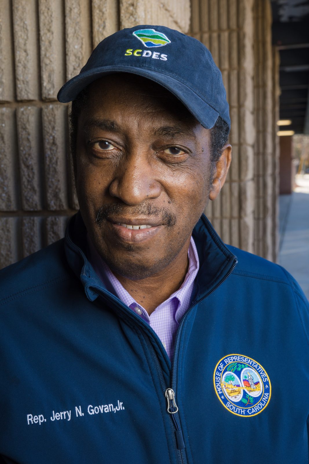 South Carolina State Rep. Jerry N. Govan Jr. in a navy jacket and SCDES cap