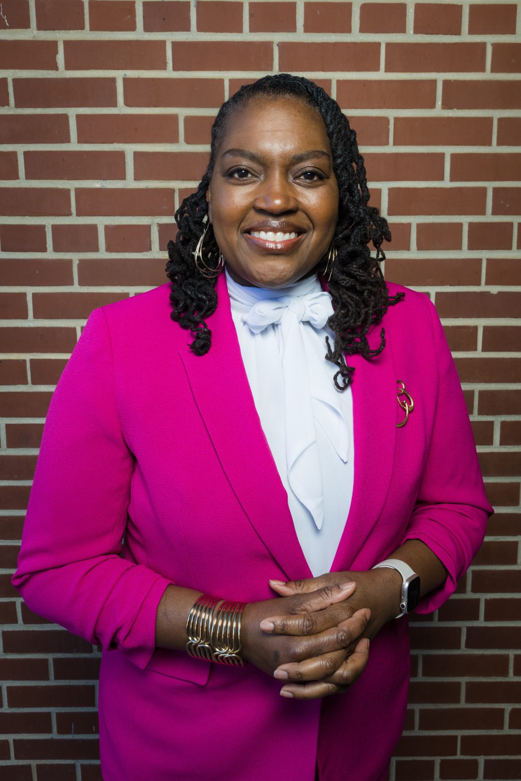 Orangeburg City Councilwoman Annette Dees Grevious in a magenta blazer