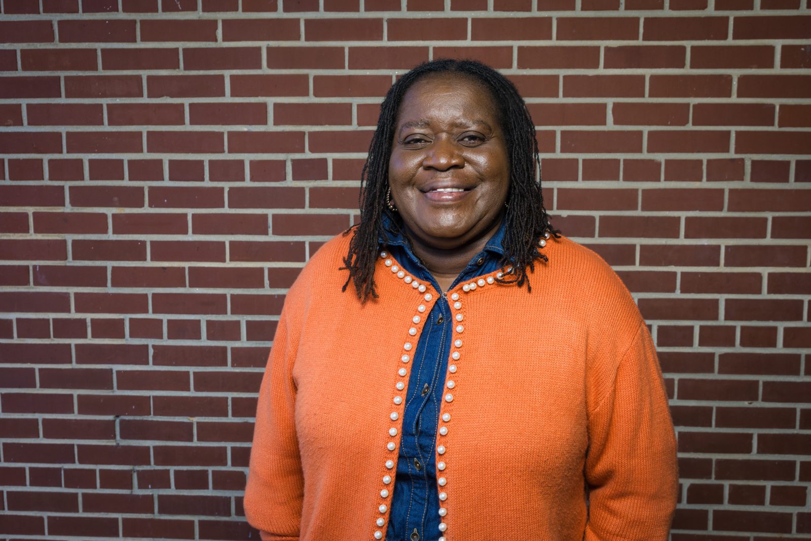 Councilwoman Phyllis Smart against a brick wall